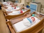 Hand-knitted hats given to babies in honor of American Heart Month