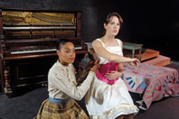 Graduate Stefannie Azoroh (left) in “Intimate Apparel”