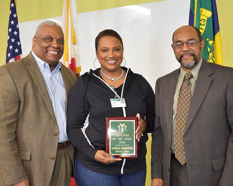 Deputy Chief Zandral Washington receives Employee of the Year.