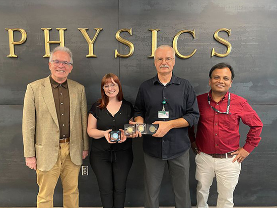 Department of Physics ceremony for patent coin, with chair Ilias Perakis, Ph.D., Riley Yager, Andrei Stanishevsky, Ph.D., and Diptiman Chanda, Ph.D., from the HIIE.