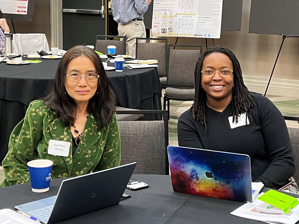 Jiahnhua Zhang and another symposium attendee.