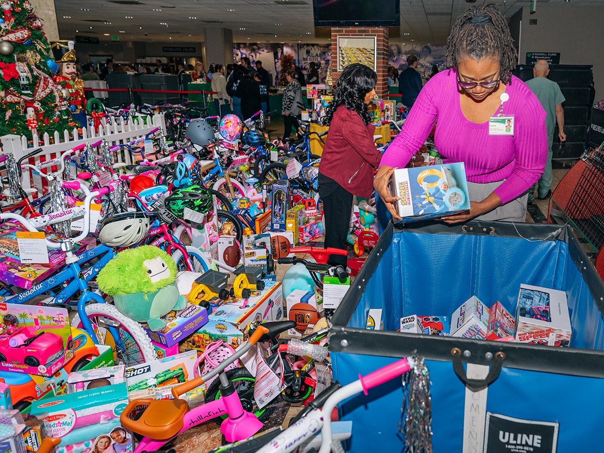 Volunteers sort donations at a toy drive