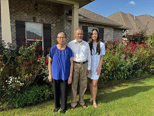 Melissa Do and her parents