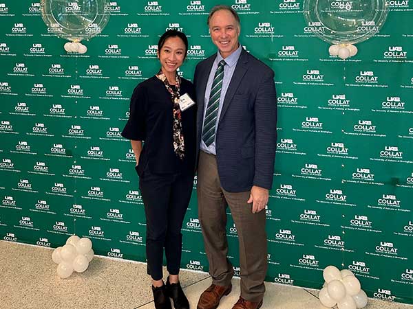 Dr. Zoe Young and SHP Dean Andrew Butler pose for picture at HLA graduation