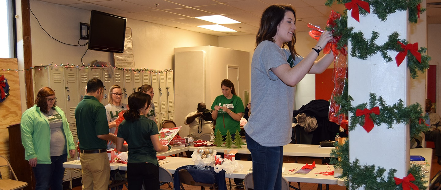 Students decorating the Firehouse Shelter in 2015.
