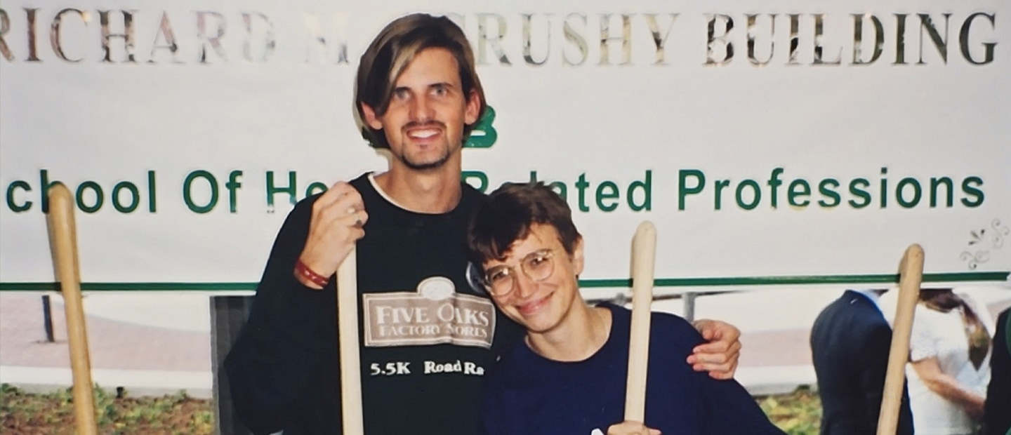 1997 picture of an adult and boy at the groudbreaking of the SHP building.