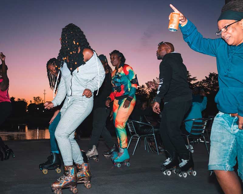 Students roller skating outside.