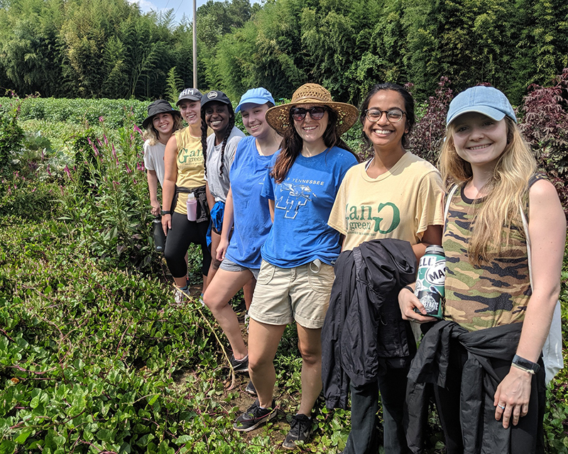 UAB students standing in a garden