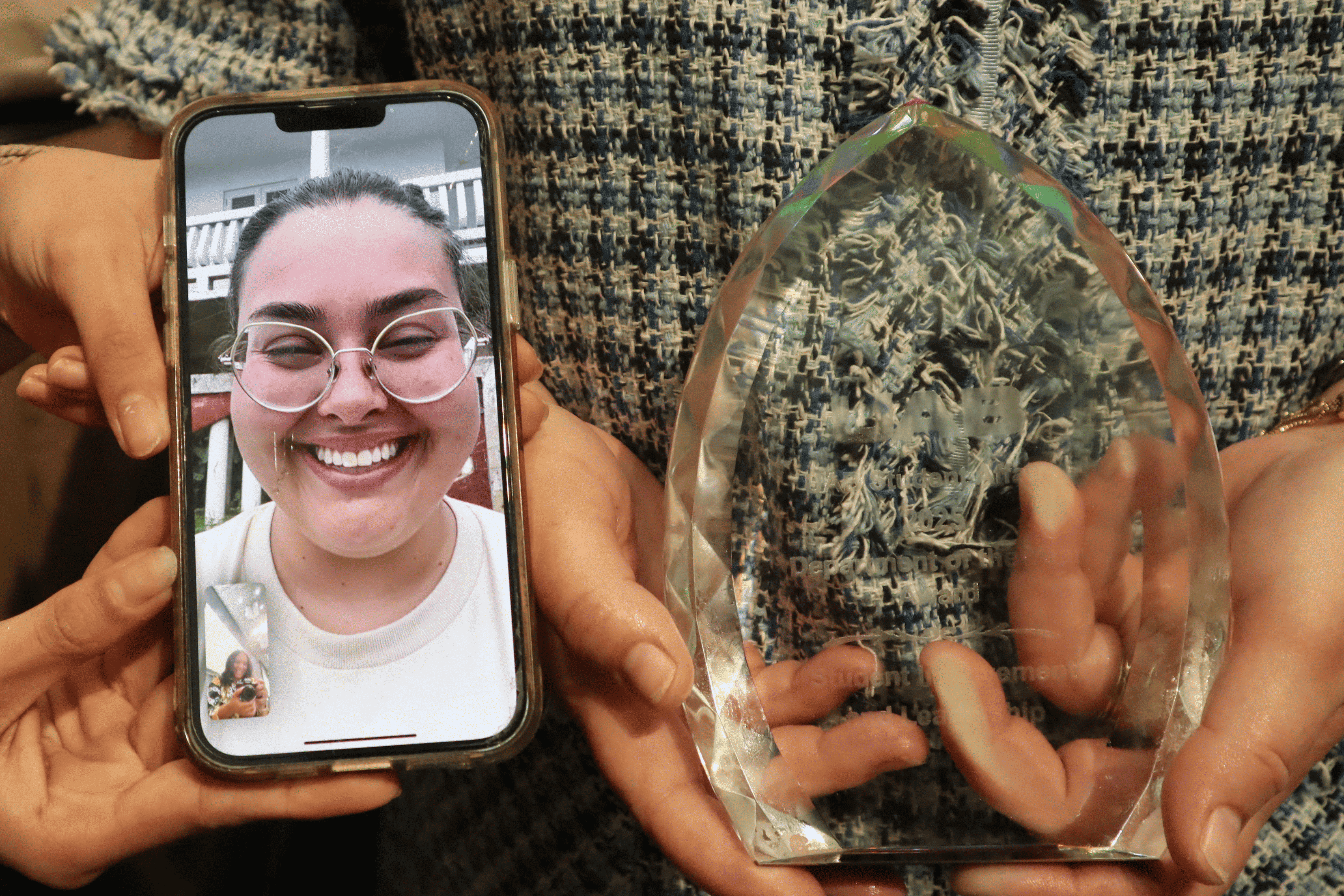 Abby Taylor with the New Professional of the Year award at 2025 End of the Year Luncheon