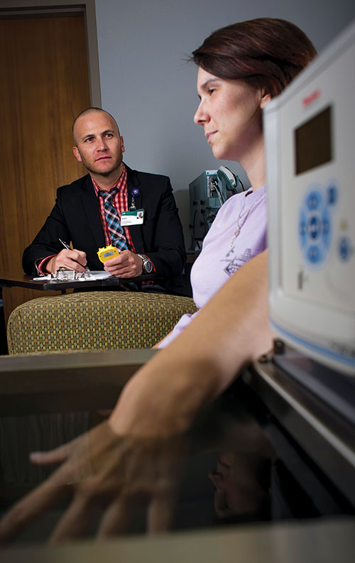 Photo of Burel Goodin with patient