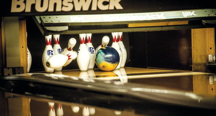 Photo of ball hitting pins