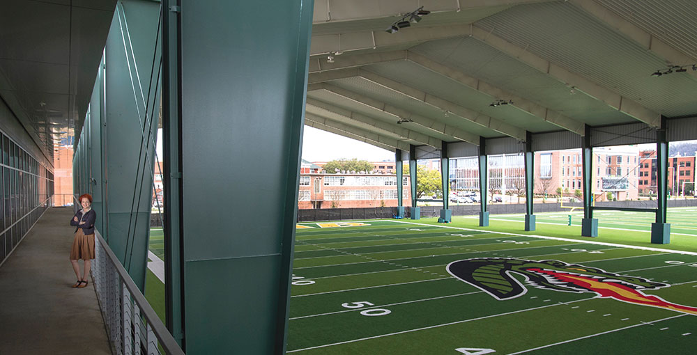 Photo of Liz Hyde above Legacy Pavilion football practice field