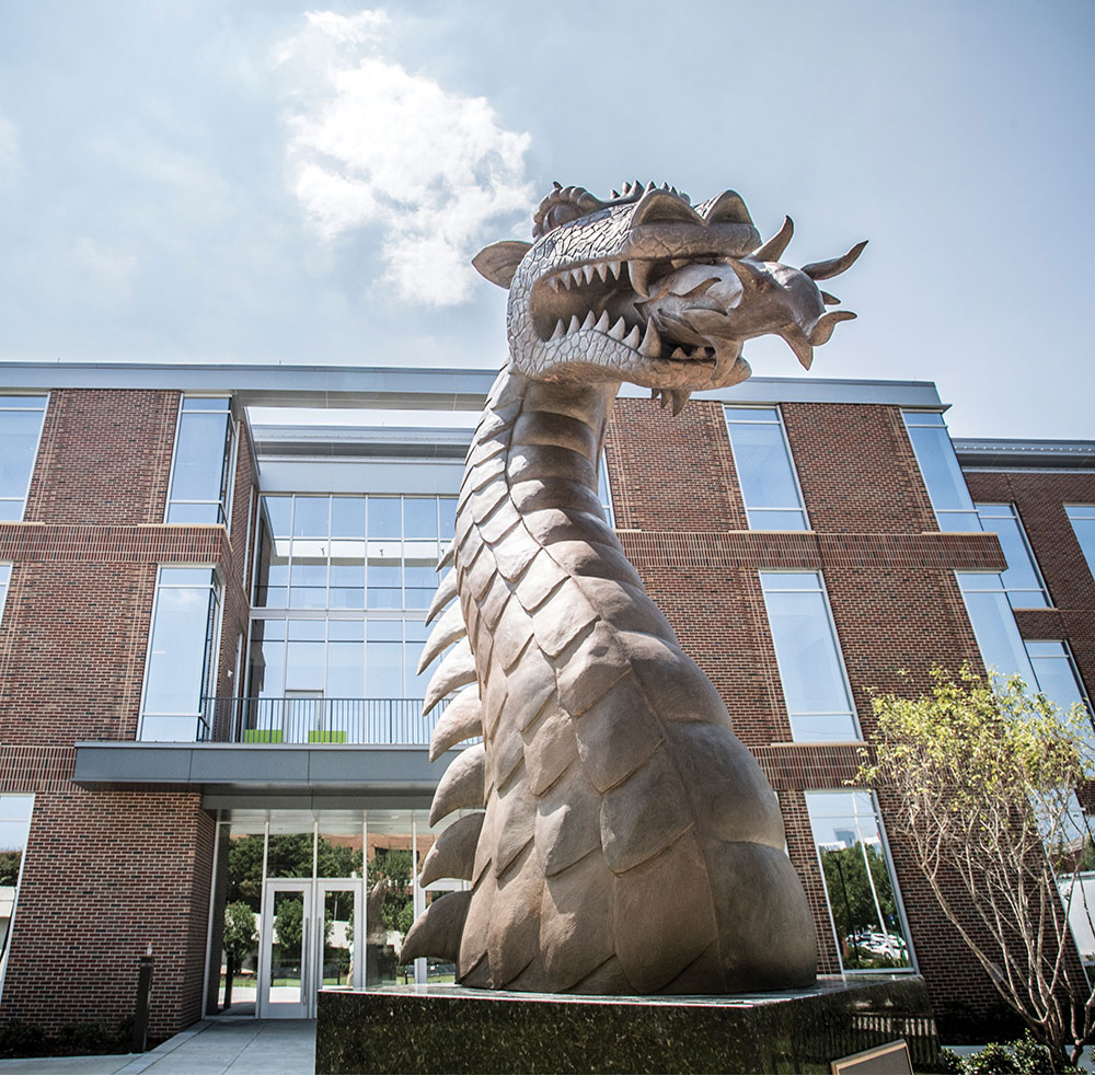 Photo of Blazer Pride Plaza with Blaze statue in front of Collat building