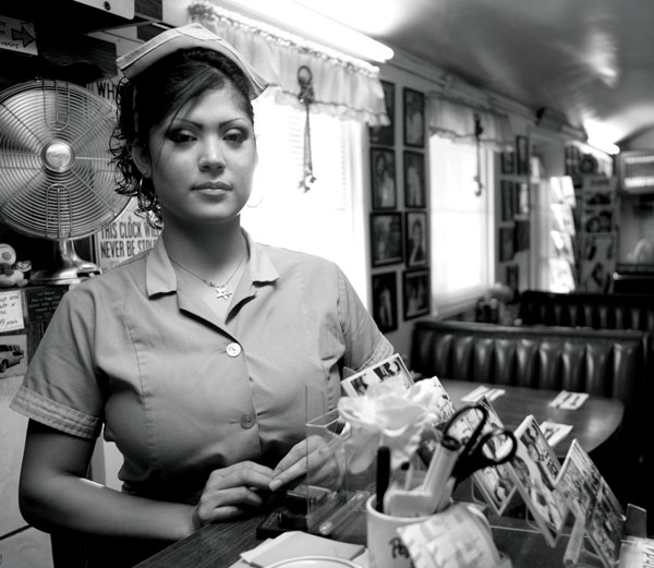 Photo of server at restaurant counter