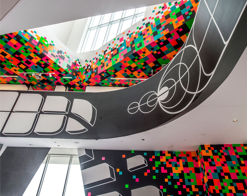 Photo of walls and ceiling covered with colorful vinyl tiles