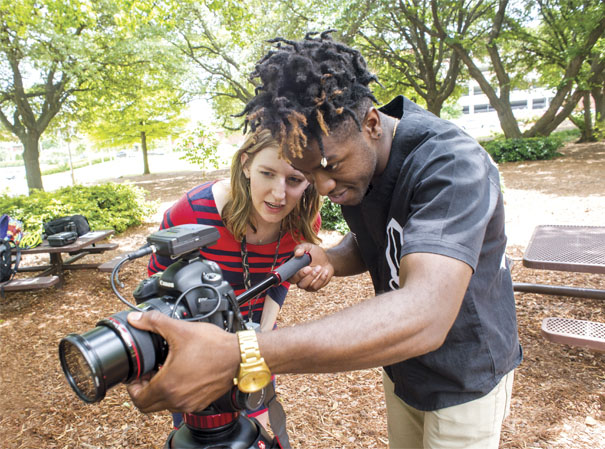 Photo of Anna Lloyd and Tyler Harris at outdoor video shoot