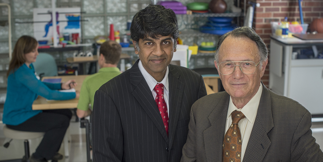 Gitendra Uswatte and Edward Taub in UAB's CI Therapy facility