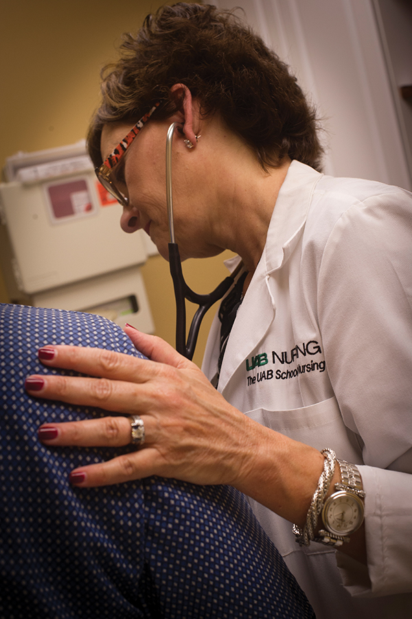 D'Ann Somerall (at right in both photos) helps to train UAB nursing students for primary- and specialty-care roles in a variety of clinical settings.