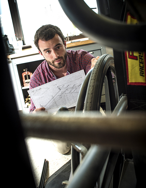 Photo of Brandon Sherrod with device prototype