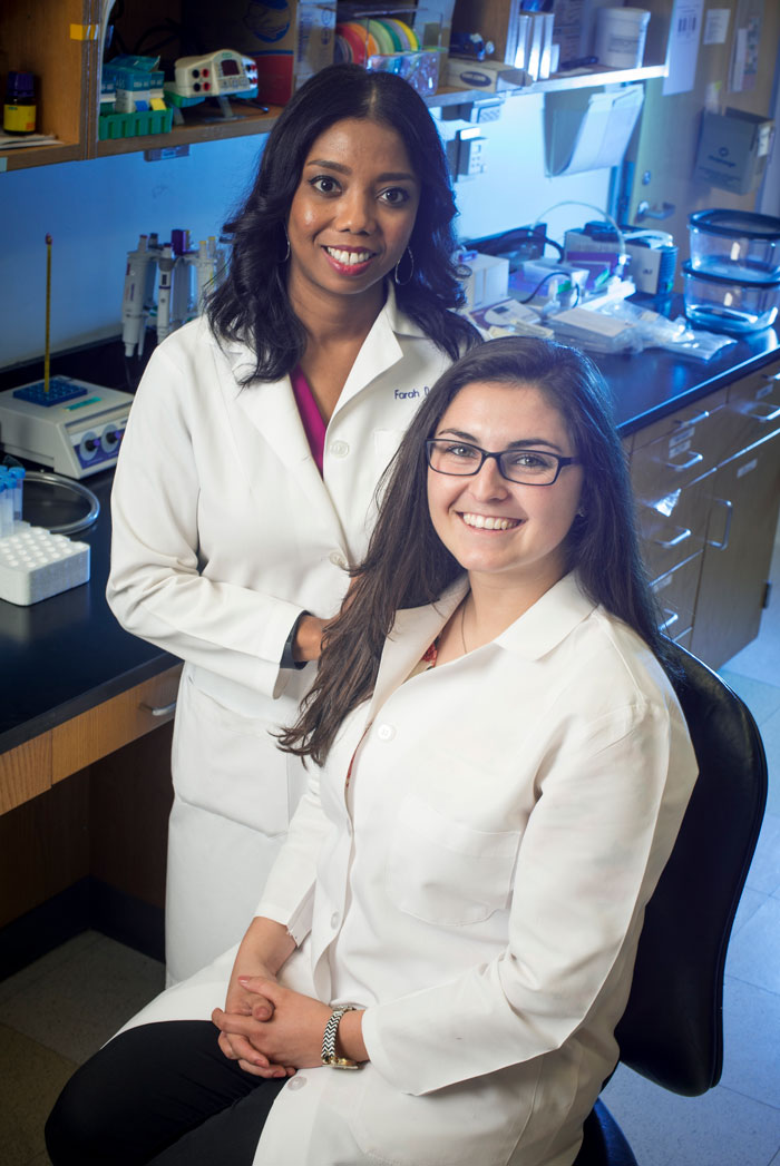 Photo of Farah Lubin and Rylie Hightower in lab