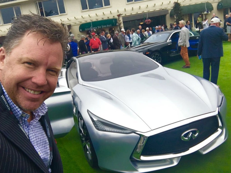 Photo of Trevor Hale with Infiniti concept car