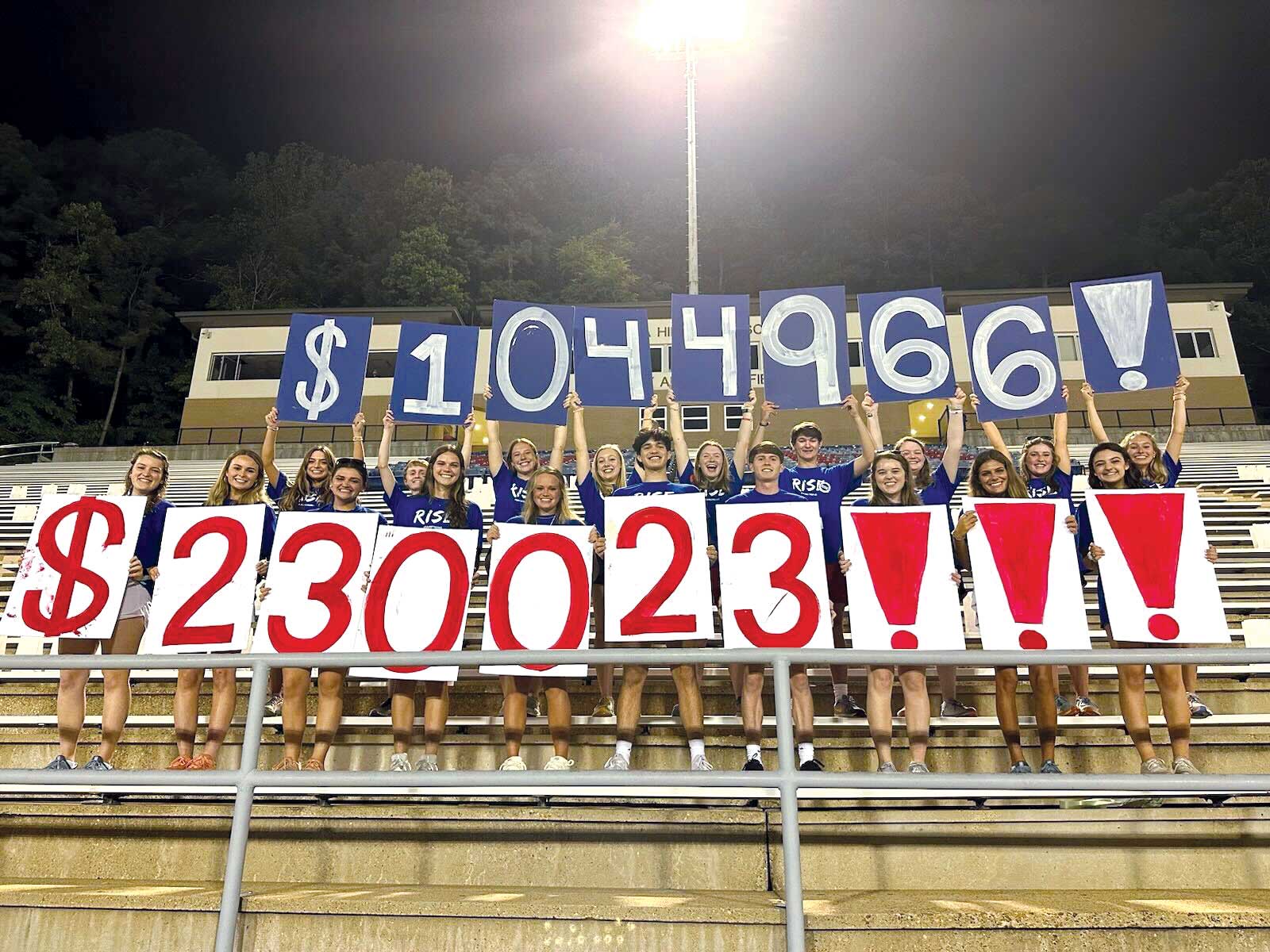 Graphic: Vestavia Hills High School students in the RISE program celebrate their fundraising achievement.