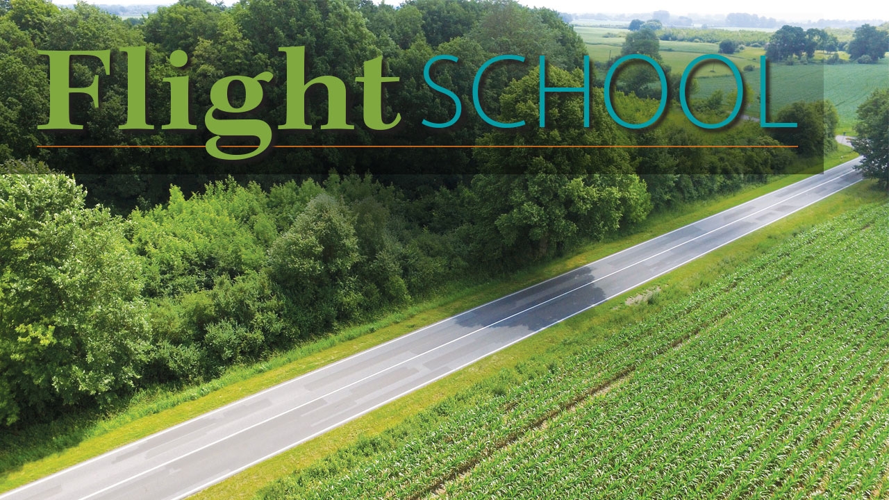 Drone photo of farmland with title: Flight School